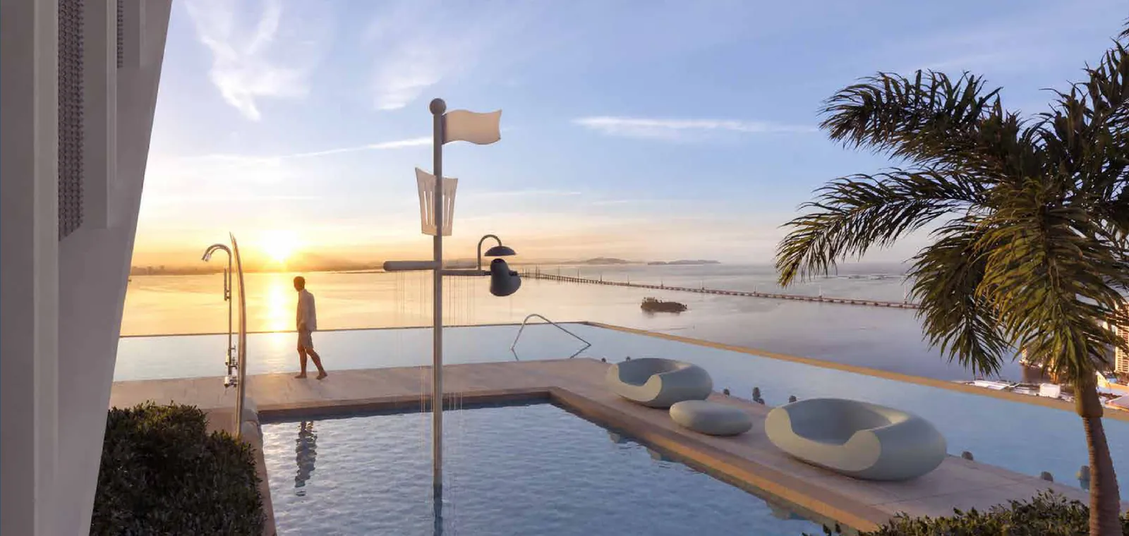 The Capehauz kids' pool with seating pods and palm trees facing the sea at sunset, artist's impression