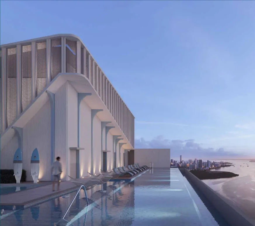 The Capehauz rooftop pool alongside the tower crown with loungers and a city view at dusk, artist's impression