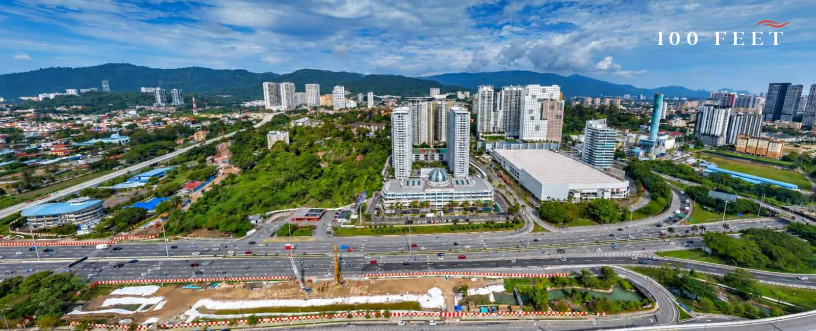 Aerial photo from about 100 feet over the site looking inland towards Gelugor and the hills